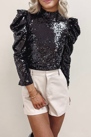 Top con mangas abullonadas y cuello simulado de lentejuelas negras